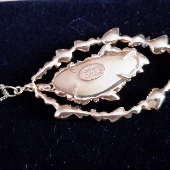 Alexis Bittar Frosted White Lucite with Crystals Necklace in gold setting.